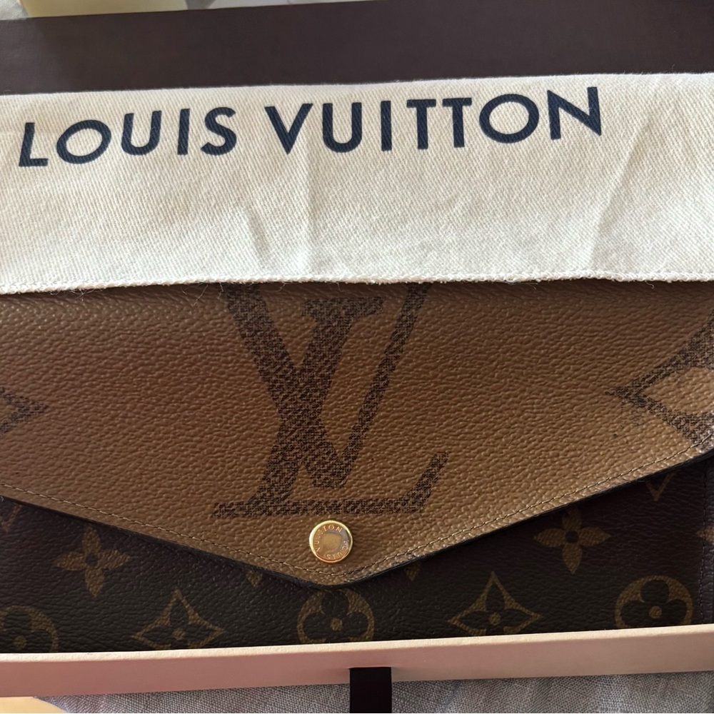 Louis Vuitton Sarah wallet revisited with Monogram reverse in brown and tan.